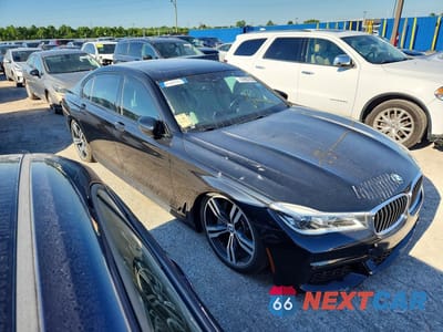 Czwarte zdjęcie samochodu z boku: 2018 BMW 750 I VIN:WBA7F0C54JGM22962 - miniatura
