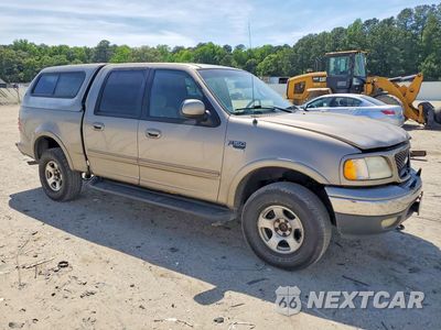 Czwarte zdjęcie samochodu z boku: 2001 FORD F150 SUPERCREW VIN:1FTRW08L81KA41972 - miniatura