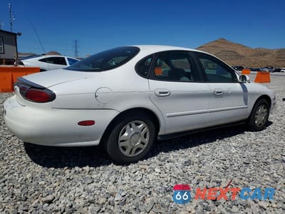 Trzecie zdjęcie samochodu z tyłu: 1999 FORD TAURUS SE VIN:1FAFP53U1XA316258 - miniatura