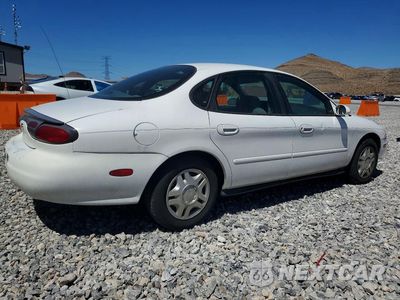 Trzecie zdjęcie samochodu z tyłu: 1999 FORD TAURUS SE VIN:1FAFP53U1XA316258 - miniatura