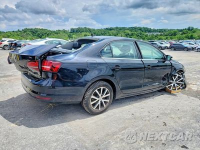Trzecie zdjęcie samochodu z tyłu: 2017 VOLKSWAGEN JETTA SE VIN:3VWDB7AJ7HM209477 - miniatura