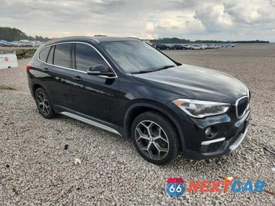 Czwarte zdjęcie samochodu z boku: 2017 BMW X1 XDRIVE28I VIN:WBXHT3C32H5F74315 - miniatura
