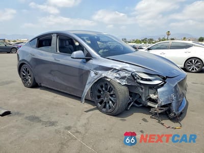 Czwarte zdjęcie samochodu z boku: 2022 TESLA MODEL Y VIN:7SAYGDEE7NF369878 - miniatura