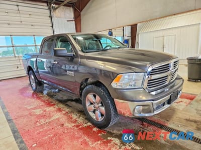 Czwarte zdjęcie samochodu z boku: 2015 RAM 1500 SLT VIN:1C6RR7LGXFS732641 - miniatura