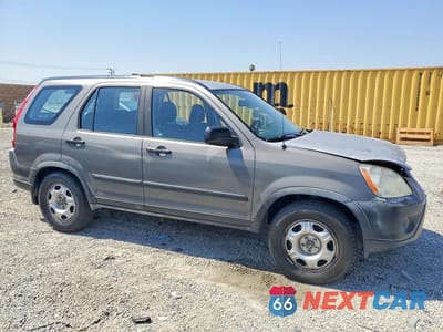 Czwarte zdjęcie samochodu z boku: 2006 HONDA CR-V LX VIN:JHLRD68526C023787 - miniatura