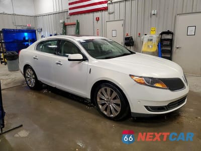 Czwarte zdjęcie samochodu z boku: 2013 LINCOLN MKS VIN:1LNHL9FT4DG610301 - miniatura