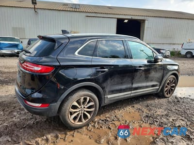 Trzecie zdjęcie samochodu z tyłu: 2019 LINCOLN MKC SELECT VIN:5LMCJ2C93KUL02046 - miniatura