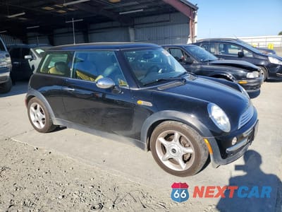 Czwarte zdjęcie samochodu z boku: 2003 MINI COOPER BASE 2D HATCH VIN:WMWRC33443TE15792 - miniatura