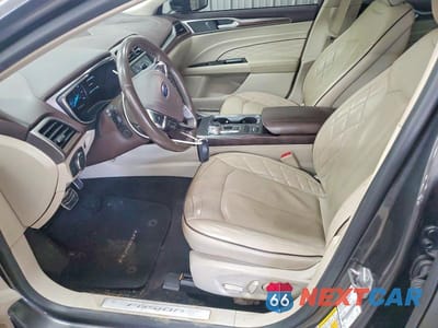 Zdjęcie 7 z 12 samochodu: 2017 FORD FUSION TITANIUM VIN:3FA6P0K96HR402012 - miniatura
