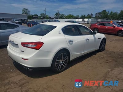Trzecie zdjęcie samochodu z tyłu: 2016 MASERATI GHIBLI S VIN:ZAM57RTA0G1165976 - miniatura