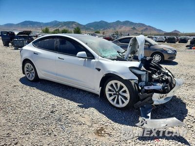 Czwarte zdjęcie samochodu z boku: 2021 TESLA MODEL 3 VIN:5YJ3E1EB7MF980526 - miniatura