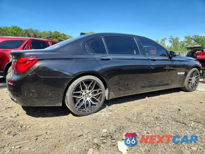 Trzecie zdjęcie samochodu z tyłu: 2015 BMW 750 LXI VIN:WBAYF8C55FD654367 - miniatura
