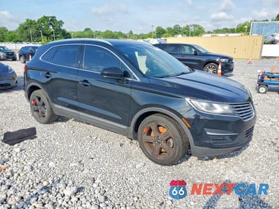 Czwarte zdjęcie samochodu z boku: 2017 LINCOLN MKC PREMIERE VIN:5LMCJ1D97HUL50683 - miniatura
