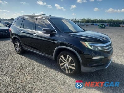Czwarte zdjęcie samochodu z boku: 2016 HONDA PILOT ELITE VIN:5FNYF6H04GB075806 - miniatura