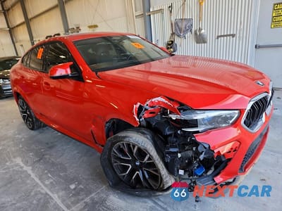 Czwarte zdjęcie samochodu z boku: 2022 BMW X6 M VIN:5YMCY0C09N9L41859 - miniatura