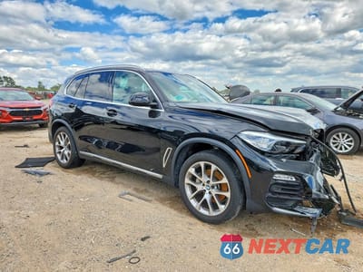 Czwarte zdjęcie samochodu z boku: 2021 BMW X5 XDRIVE40I VIN:5UXCR6C01M9F43779 - miniatura