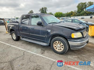 Czwarte zdjęcie samochodu z boku: 2003 FORD F150 SUPERCREW VIN:1FTRW07663KC62856 - miniatura