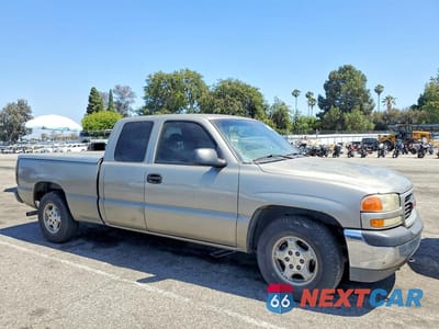 Czwarte zdjęcie samochodu z boku: 2002 GMC NEW SIERRA C1500 VIN:2GTEC19XX21217159 - miniatura