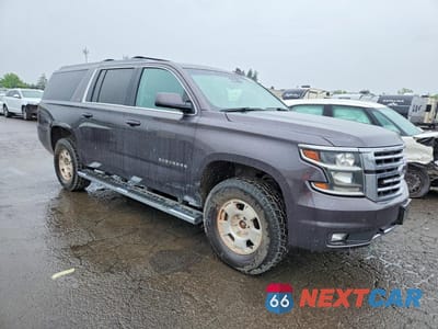 Czwarte zdjęcie samochodu z boku: 2016 CHEVROLET SUBURBAN K1500 LT VIN:1GNSKHKC5GR206128 - miniatura