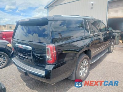 Czwarte zdjęcie samochodu z boku: 2016 GMC YUKON XL DENALI VIN:1GKS2HKJ9GR433544 - miniatura