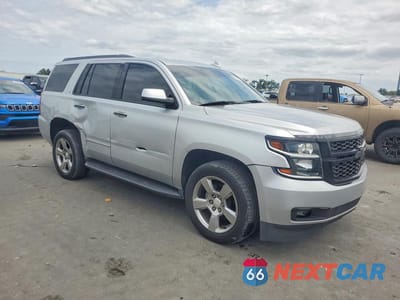 Czwarte zdjęcie samochodu z boku: 2018 CHEVROLET TAHOE C1500 LT VIN:1GNSCBKC7JR213714 - miniatura