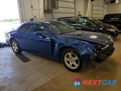 Czwarte zdjęcie samochodu z boku: 2010 DODGE CHALLENGER SE VIN:2B3CJ4DV1AH103000 - miniatura