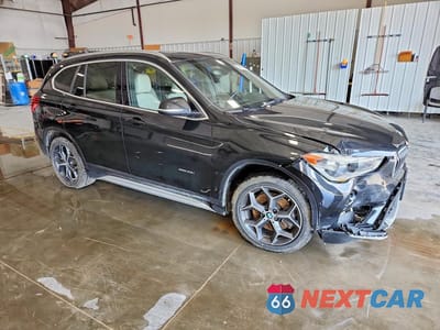 Czwarte zdjęcie samochodu z boku: 2016 BMW X1 XDRIVE28I VIN:WBXHT3C31GP884701 - miniatura