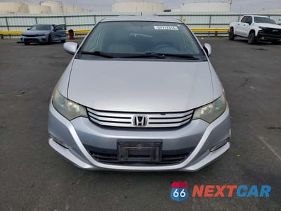 Piąte zdjęcie samochodu w środku: 2010 HONDA INSIGHT LX VIN:JHMZE2H55AS042012 - miniatura