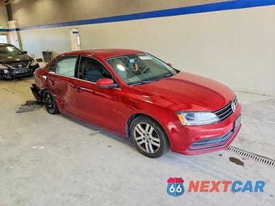 Czwarte zdjęcie samochodu z boku: 2017 VOLKSWAGEN JETTA S VIN:3VW2B7AJ7HM349195 - miniatura