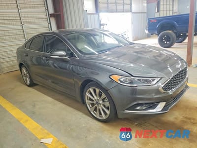 Czwarte zdjęcie samochodu z boku: 2017 FORD FUSION TITANIUM VIN:3FA6P0K96HR402012 - miniatura