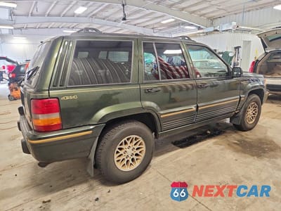 Trzecie zdjęcie samochodu z tyłu: 1995 JEEP GRAND CHEROKEE LIMITED VIN:1J4GZ78Y0SC528561 - miniatura