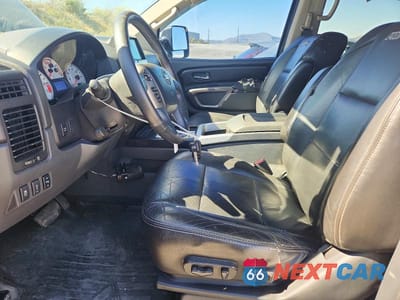Zdjęcie 7 z 12 samochodu: 2015 NISSAN TITAN PRO-4X VIN:1N6BA0EC9FN510090 - miniatura