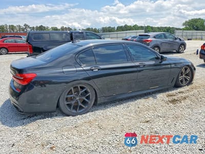 Trzecie zdjęcie samochodu z tyłu: 2017 BMW 740 I VIN:WBA7E2C52HG740376 - miniatura