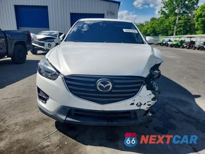 Piąte zdjęcie samochodu w środku: 2016 MAZDA CX-5 GT VIN:JM3KE4DY1G0611366 - miniatura