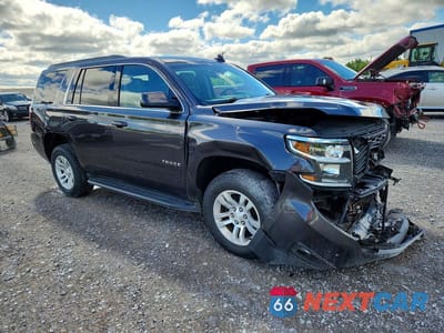 Czwarte zdjęcie samochodu z boku: 2017 CHEVROLET TAHOE K1500 LT VIN:1GNSKBKCXHR242864 - miniatura