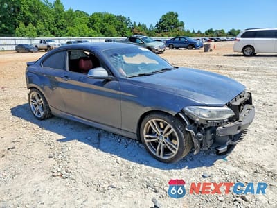Czwarte zdjęcie samochodu z boku: 2016 BMW M235I VIN:WBA1J7C52GV359443 - miniatura