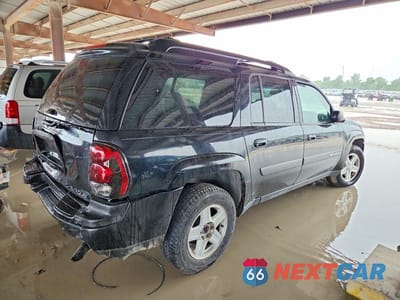 Trzecie zdjęcie samochodu z tyłu: 2003 CHEVROLET TRAILBLAZER EXT VIN:1GNES16S036243962 - miniatura