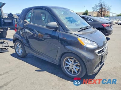 Czwarte zdjęcie samochodu z boku: 2016 SMART FORTWO VIN:WMEEJ9AA5GK844839 - miniatura