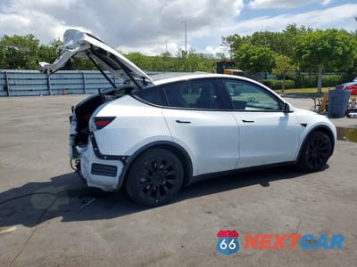 Trzecie zdjęcie samochodu z tyłu: 2022 TESLA MODEL Y VIN:7SAYGAEE8NF390270 - miniatura