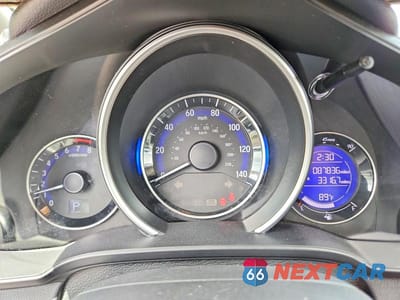 Zdjęcie 9 z 12 samochodu: 2016 HONDA FIT EX VIN:JHMGK5H76GX013942 - miniatura