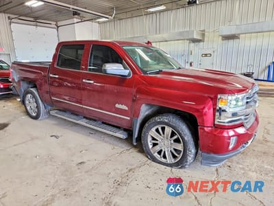 Czwarte zdjęcie samochodu z boku: 2016 CHEVROLET SILVERADO K1500 HIGH COUNTRY VIN:3GCUKTEC3GG237572 - miniatura