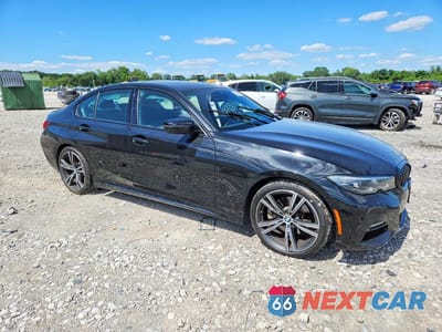 Czwarte zdjęcie samochodu z boku: 2022 BMW 330XI VIN:3MW5R7J04N8C44473 - miniatura
