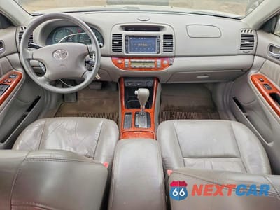 Zdjęcie 8 z 12 samochodu: 2002 TOYOTA CAMRY XLE V6 VIN:4T1BF30K52U513679 - miniatura