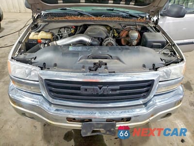 Zdjęcie 11 z 12 samochodu: 2006 GMC NEW SIERRA K1500 VIN:1GTEK19B36E168897 - miniatura