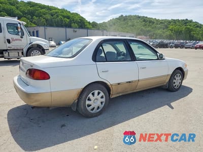 Trzecie zdjęcie samochodu z tyłu: 2002 TOYOTA COROLLA LE VIN:1NXBR12E12Z584221 - miniatura