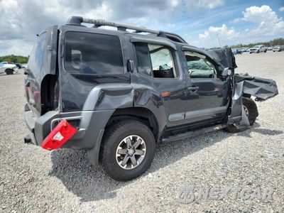 Trzecie zdjęcie samochodu z tyłu: 2014 NISSAN XTERRA PRO-4X VIN:5N1AN0NW8EN807276 - miniatura