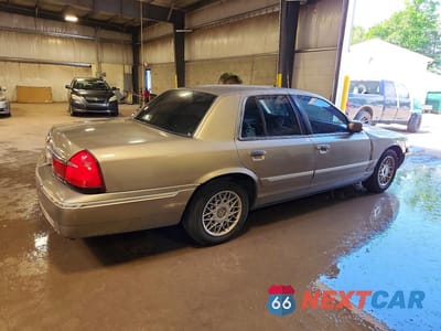 Trzecie zdjęcie samochodu z tyłu: 2002 MERCURY GRAND MARQUIS GS VIN:2MEFM74W02X664503 - miniatura
