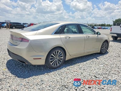 Trzecie zdjęcie samochodu z tyłu: 2017 LINCOLN MKZ SELECT VIN:3LN6L5C91HR647927 - miniatura