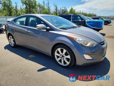 Czwarte zdjęcie samochodu z boku: 2011 HYUNDAI ELANTRA VIN:5NPDH4AE6BH075657 - miniatura
