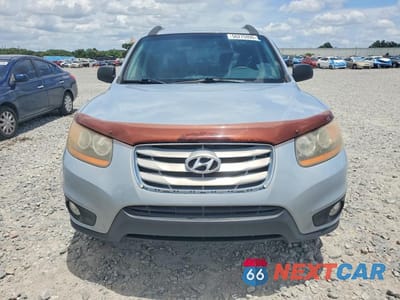 Piąte zdjęcie samochodu w środku: 2010 HYUNDAI SANTA FE GLS VIN:5NMSG3AB9AH395884 - miniatura